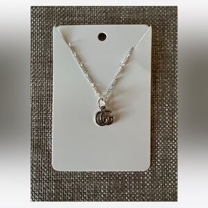 gucci charm/zipper pull repurposed to necklace